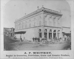 A.P. Whitney, dealer in groceries, provisions, grain and country produce, corner Main and English Streets, Petaluma, California, about 1880