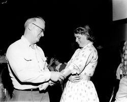 Clement Stimson square dancing with an unknown partner