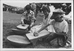 Grinding corn at an Old Adobe Fiesta, Petaluma, California, about 1962