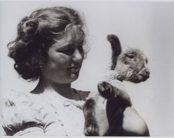 Jacquelyn L. Travis and her lamb, Forestville, California, 1947