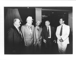 Five men at a wine tasting at the Four Season's Clift Hotel in San Francisco, California