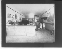 Interior view of an unidentified real estate and insurance office, Petaluma, California(?), about 1900