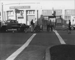 Painting a crosswalk on Petaluma Boulevard, Petaluma, California, about 1957