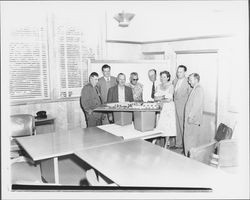 Looking at a model of a new junior high school, Petaluma, California, 1955