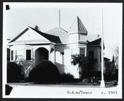 Late Queen Anne cottage with tower