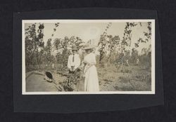 William S. Borba and his wife among the hops