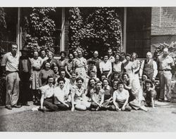 Group of employees of the Sunset Line and Twine Company pose in front of the manufacturing plant in Petaluma, California, 1940s