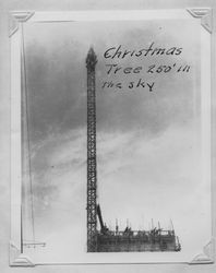 Christmas tree atop the Poultry Producers of Central California grain elevator at 323 East Washington Street, Petaluma, California while under construction, 1937