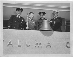 Members of the fire department with a bell, Petaluma, California, 1955