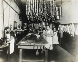 Unidentified men working in the C. Gervasoni & Sons Butcher Shop, Petaluma, California, about 1922
