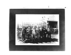 Men standing in front of a Camm and Hedges tank car, Petaluma, California, 1900