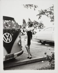 Jo Ellen Fisher, Miss Contra Costa County, modeling a bamboo satin cocktail costume, Santa Rosa, California, 1959