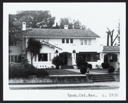 Spanish Colonial Revival residence with second story veranda