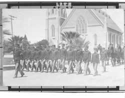 First Corps Cadets marching in front of old St. Vincent's Church, Petaluma, California, about 1915