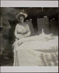 Woman working near a tent, Marin County, California, between 1900 and 1910
