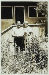 Peter P. Girolo and Josephine P. Girolo standing in their yard in Santa Rosa, California, 1940