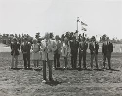 Members of the Sonoma County Fair Board standing on the race track on Sebastopol Day, Santa Rosa, California, about 1973