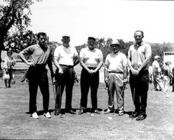 Golfers at opening day at Oakmont Golf Course