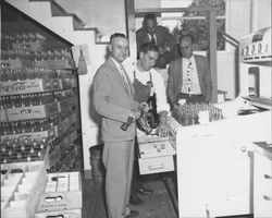 Dignitaries at the Coca Cola Bottling Company of Petaluma and Sonoma, Petaluma, California, about 1940