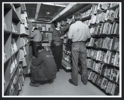 Librarian Linda Haering with Honor Farm inmates in the bookmobile