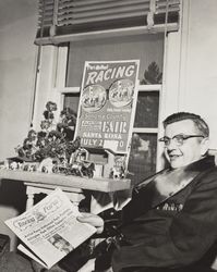 Jack Liebau with the racing form at the Sonoma County Fair, Santa Rosa, California, July 24, 1955