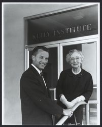 Lucile Kelly and unidentified man on the steps of the Kelly Institute at Memorial Hospital, Santa Rosa, California, 1963