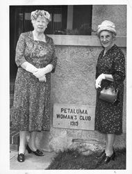 Women standing beside the Woman's Club cornerstone, Petaluma, California, about 1950