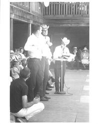 Men at a microphone at the Old Adobe Fiesta, Petaluma, California, 1967