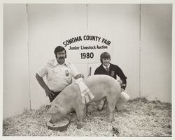 Eric Hold and his FFA Reserve Grand Champion cross breed hog at the Sonoma County Fair, Santa Rosa, California, 1980