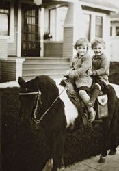 Dorothy and Marjorie Cochrane on a pony in front of 245 Keokuk Street, Petaluma, California, about 1927