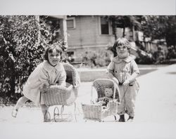 Shirley L. Ware and Virginia G. Ware at play with their dolls in Santa Rosa, California, 1924