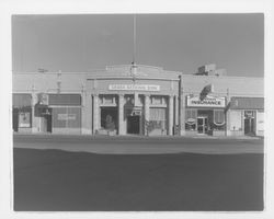 Sierra National Bank and nearby businesses, Petaluma, California, 1970