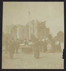 Court House with large crowd gathered in street