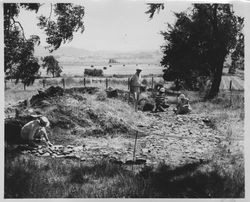 Clemmer group uncovering a foundation on the east side of the Old Adobe, Petaluma, California, Jun. 17, 1961