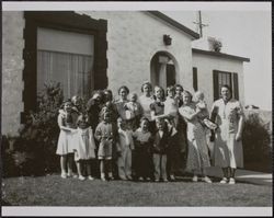 Group of attendees of Joan Spolini's first birthday party, 200 Dana Street, Petaluma, California, 1937