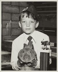 Boy with his winning rabbit at the Sonoma County Fair, Santa Rosa, California