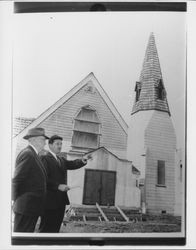 Robert Kostka shows Everett Foster around the newly relocated Church Built from One Tree, Santa Rosa, California, April 3, 1958