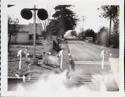 South side of Hearn Avenue from railroad crossing to bridge, looking west