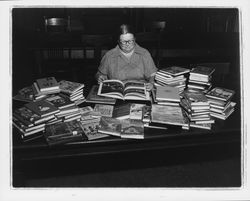 Doris Cole with many children's books at the Petaluma Public Library, Petaluma, California, May 15, 1961