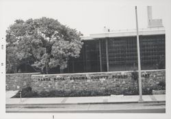 Library's basalt wall before and after erection of the Library sign