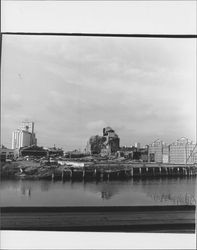 View of the dismantling of the Golden Eagle Milling Company warehouse, Petaluma, California, 1965