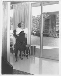 Black balloon dress modeled at a fashion show at the Flamingo Hotel, Santa Rosa, California, 1958