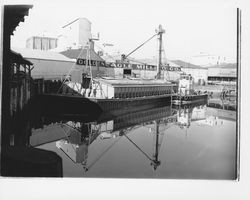 Barge docked at Golden Eagle Milling Co., Petaluma, California, 1953