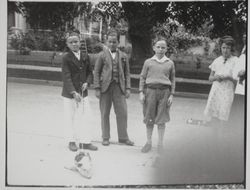 Children with a pig on a leash at the Rose Parade