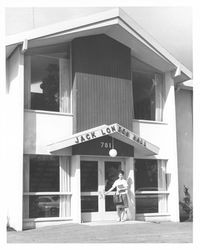 Girl standing in front of Jack London Hall, Rohnert Park, California, 1963