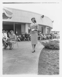 Two-piece coat and skirt ensemble modeled in the Dramatic Moods of Autumn Fashion Show, Santa Rosa, California, 1959