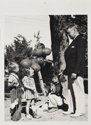 George R. Cadan and his grandchildren at the Sonoma County Fair, Santa Rosa, California, 1937