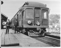 Train on dual guage track at West End Station