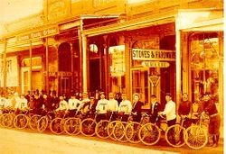 Healdsburg Wheelmen with their bicycles on West Street