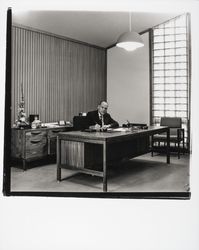 Roderick Bryan behind his desk at Summit Savings, Santa Rosa, California, 1970